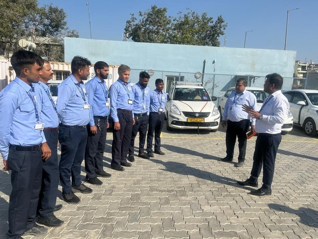 ADS drivers lined up for briefing at the cab yard