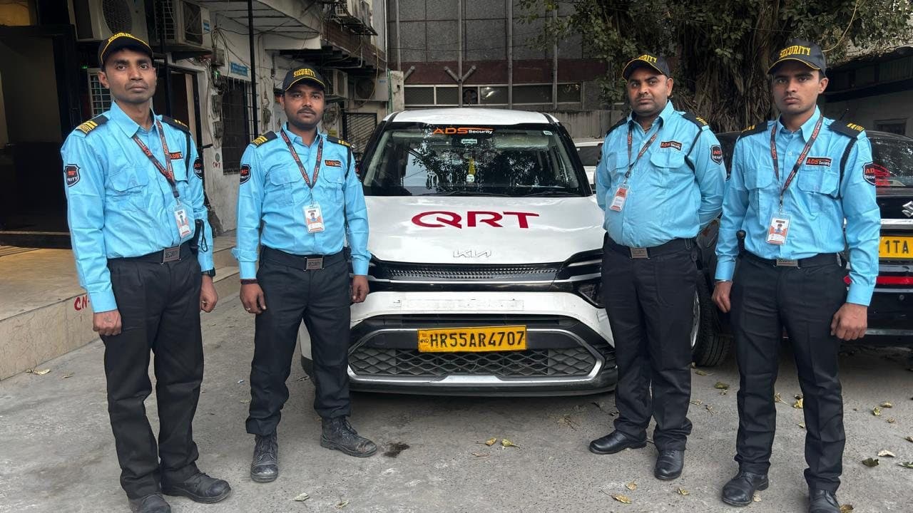 ADS Quick Response Team beside their branded QRT vehicle