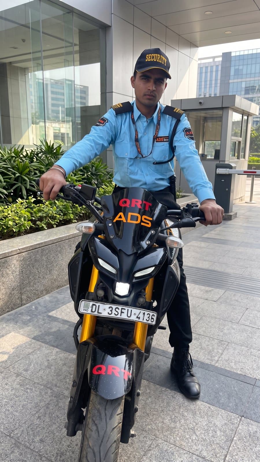 ADS QRT rider on a branded rapid-response motorcycle