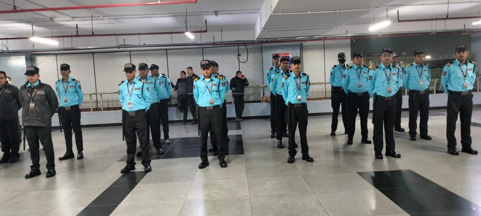ADS guards in formation at a metro concourse roll call